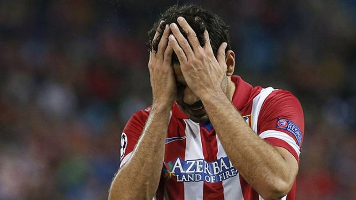 Diego Costa se lamaenta de una oportunidad fallida en un partido del Atlético.