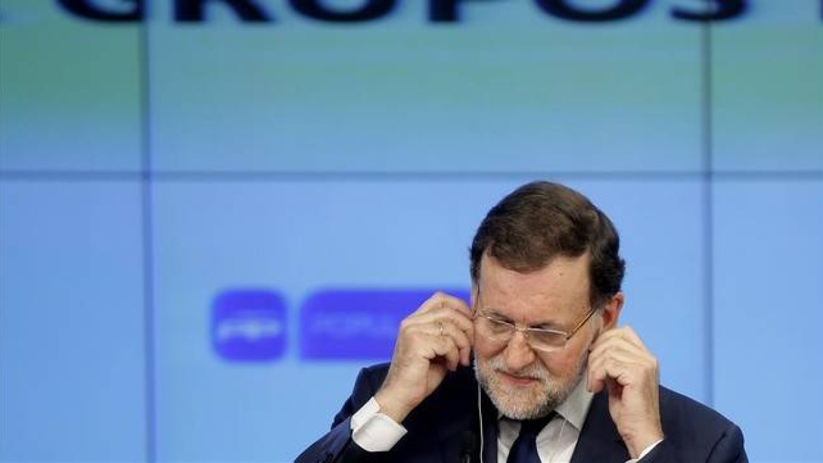 Mariano Rajoy, durante la rueda de prensa que ha ofrecido este lunes en la sede del PP tras reunirse con Nicolas Sarkozy.