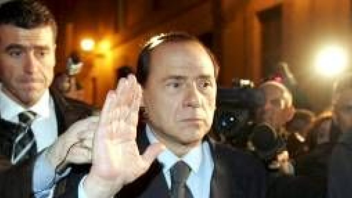 Silvio Berlusconi abandona el Palacio de Montecitorio, sede de la Cámara de Diputados