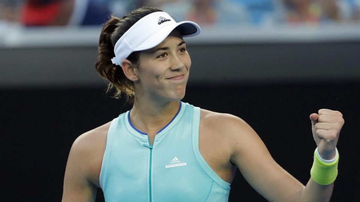 Muguruza celebra un punto ganado ante Cirstea.