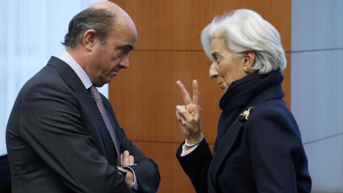 El ministro de Economía, Luis de Guindos, y la directora del FMI, Christine Lagarde, en febrero del 2013.