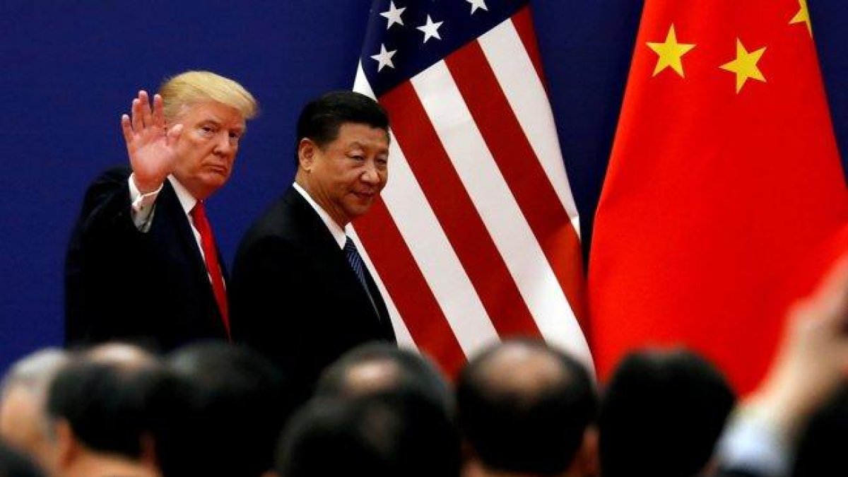 Donald Trump y Xi Jinping en una reunión oficial.