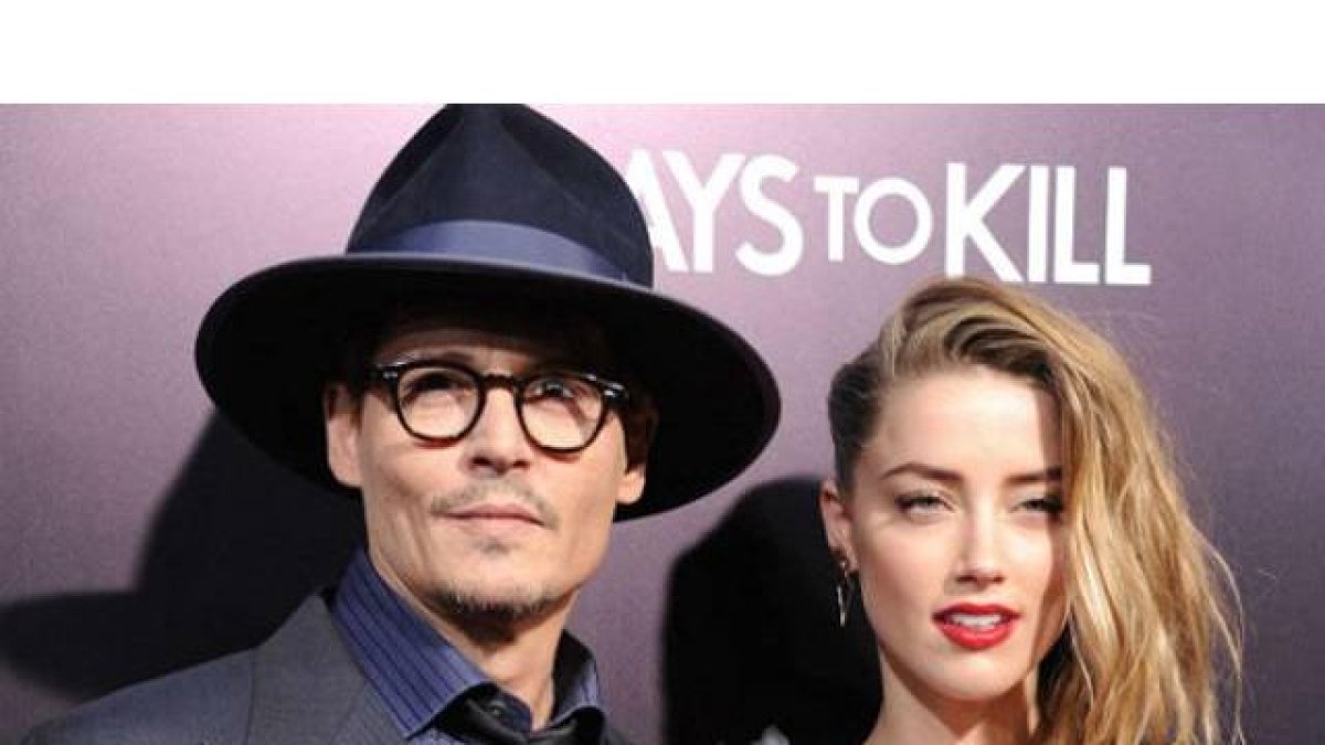 Johnny Depp y su ya esposa, Amber Heard, en una reciente 'premiere'.
