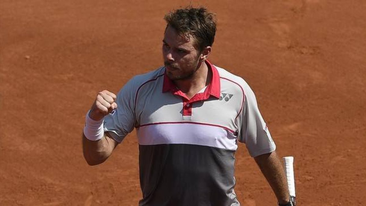 Wawrinka celebra un punto ante Tsonga.