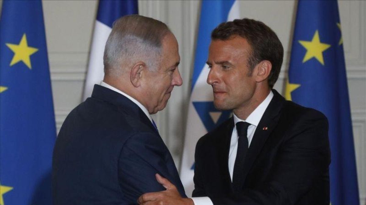Netanyahu y Macron se saludan antes de atender a la prensa tras su encuentro en París