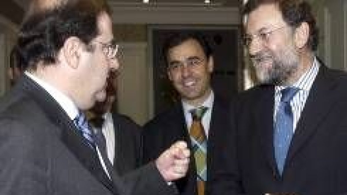 Herrera y Rajoy, ayer en un acto del PP, en el que valoraron la OCM