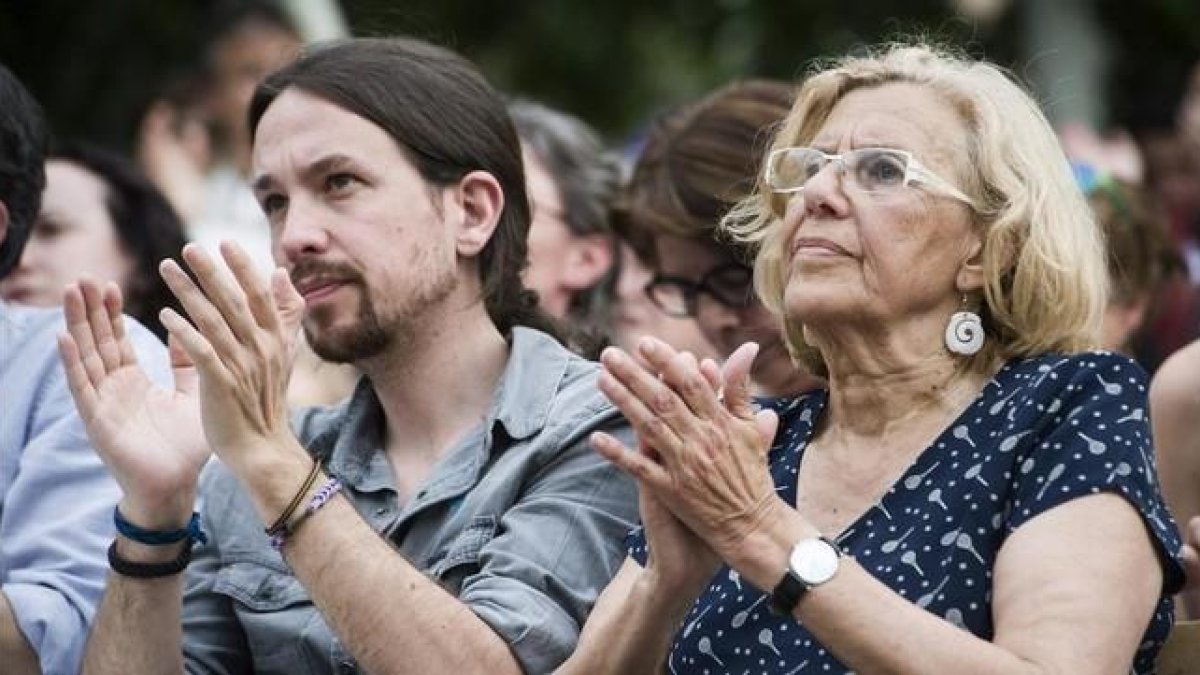 Pablo Iglesias y Manuela Carmena, en un mitin en Madrid.