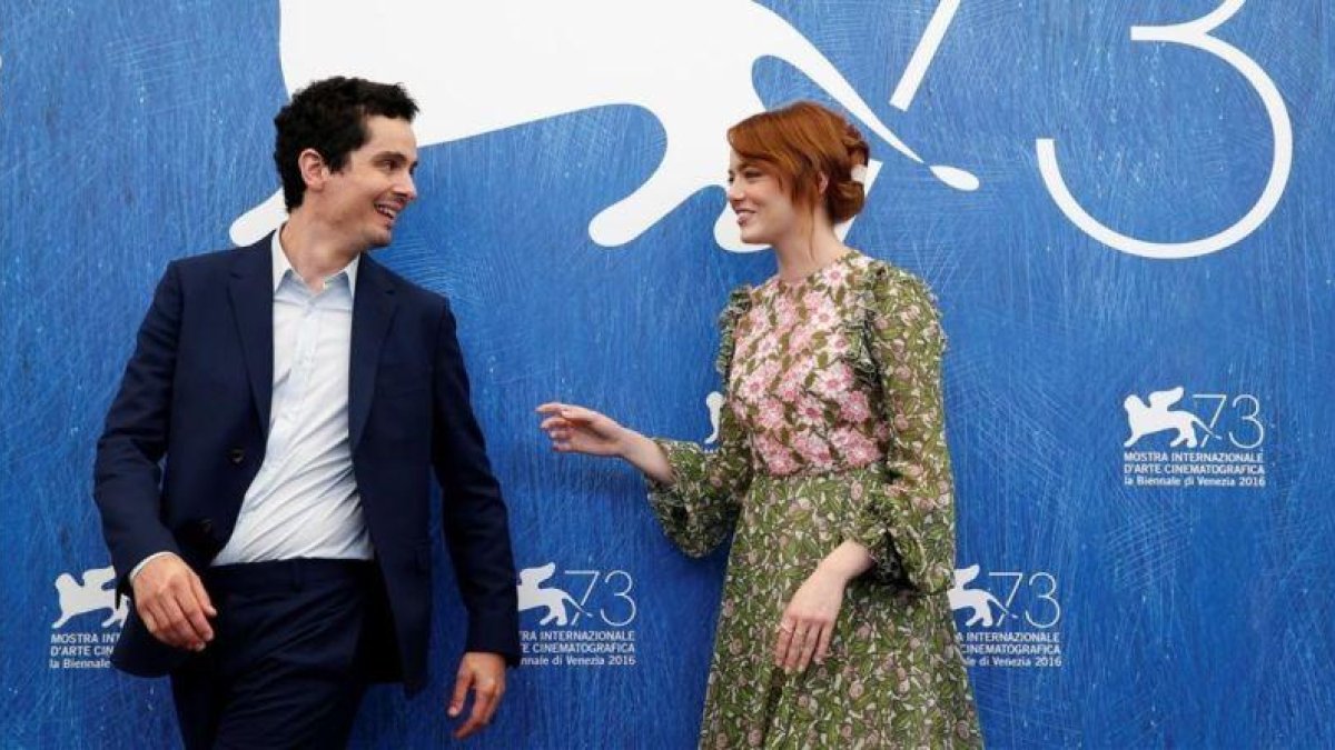 Damien Chazelle y Emma Stone, en la presentación de 'La La Land' en Venecia.