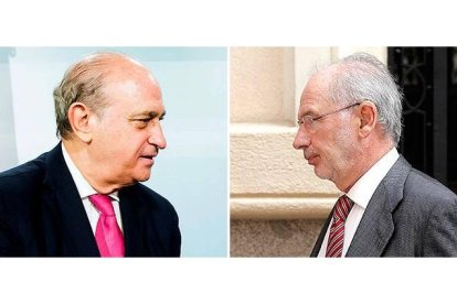 Jorge Fernández Díaz, ministro del Interior, y Rodrigo Rato, exvicepresidente del Gobierno y exministro de Economía.