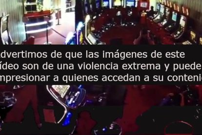 Imágenes en las que se ve a un hombre disparando a sangre fría en la cabeza de otro en un salón recreativo de Santa Coloma.