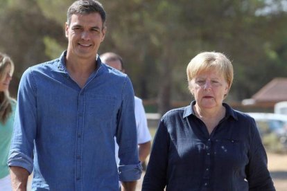 El presidente y la canciller, en la visita de ésta a Doñana.