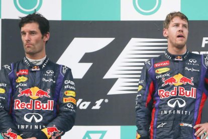 Webber y Vettel, tensos y distantes en el podio de Sepang.