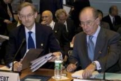 El presidente del Banco Mundial Zoellick y el director del Fondo Rato