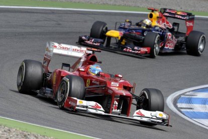 Vettel, tras Fernando Alonso, en el pasado Gran Premio de Alemania.