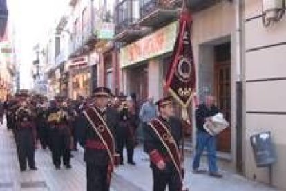 La banda del Bendito Cristo de los Afligidos durante el pasacalles