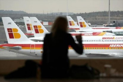 Aviones de Iberia, en el aeropuerto de Madrid.