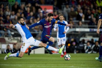 Messi, en acción, en un partido en el que ha conseguido tres goles, los tres del Barça.