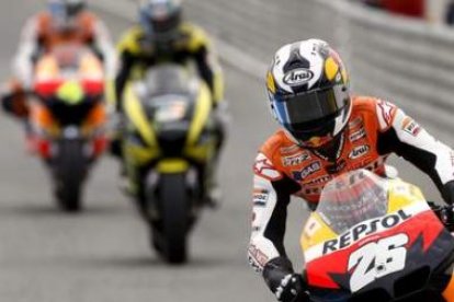 Pedrosa, por delante de Aoyama y Dovizioso, no pudo repetir la pole del pasado año en Jerez.