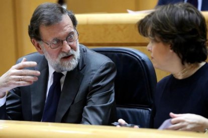 Mariano Rajoy y Soraya Sáenz de Santamaría, en el Senado.