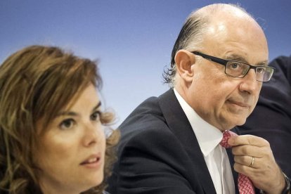 Soraya Sáenz de Santamaría y Cristóbal Montoro.