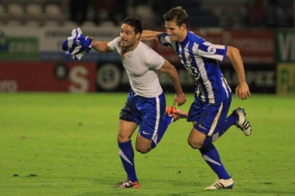 Doménech y Mayordomo celebran el triunfo en el 2011. L. DE LA MATA