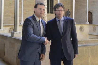 El 'president' Carles Puigdemont y el líder de Ciudadanos, Albert Rivera.