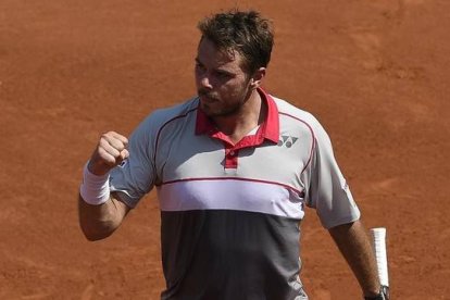 Wawrinka celebra un punto ante Tsonga.