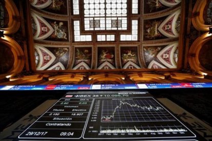 Panel con las cotizaciones del Ibex 35 en la Bolsa de Madrid.