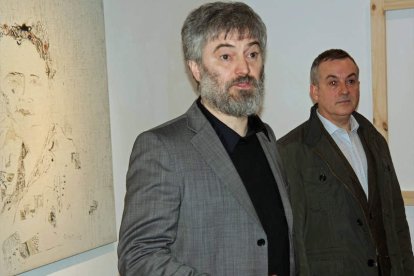 Jesús Palmero y Manuel Olveira en la exposición del CLA. CUEVAS