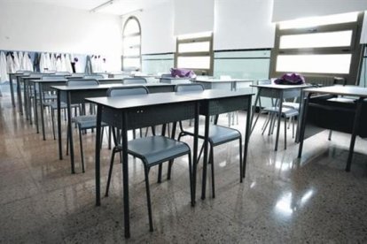 Pupitres vacíos 8 Aula del colegio concertado Marillac, en el Eixample de Barcelona, ayer