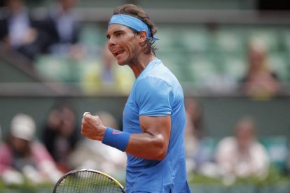 Nadal, durante el partido que ha disputado este jueves contra Almagro, en Roland Garros.