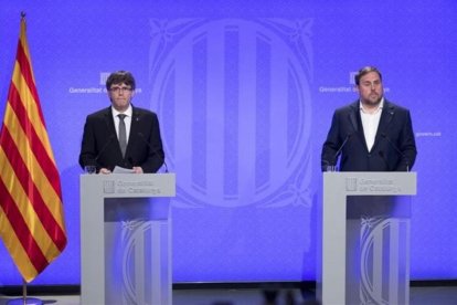 Carles Puigdemont y Oriol Junqueras.