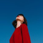 Imagen de una mujer con los labios rojos CÉLINE