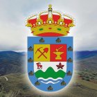 El escudo de Valle de Ancares sobre una imagen de la zona.