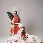 Cristina Pedroche vuelve a dar una vuelta de tuerca a su vestuario en las campanadas, con un diseños surprarreciclado con detalles de sus 11 vestidos anteriores, un diseño con el que quiere reconocer la labor que la Asociación Española Contra el Cáncer realiza hacia las personas con cáncer y sus familias.  EFE/Andrés Gar Luján/Cedidas por Cristina Pedroche -SOLO USO EDITORIAL/SOLO DISPONIBLE PA.