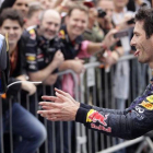 Mark Webber celebra uno de sus podios con el equipo Red Bull.