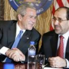 George W. Bush con el primer ministro de Irak, Nuri al Maliki, durante su reunión en Bagdad