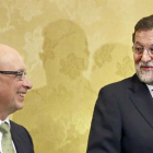 Cristóbal Montoro y Mariano Rajoy.