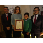 José Antonio Fresno, Aurora García, su hijo y Manuel Ángel Fernández, en el acto de ayer. MARCIANO