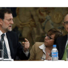 Rajoy, junto al ministro de hacienda, Cristobal Montoro.