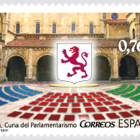 El sello toma como imagen de fondo el claustro de San Isidoro