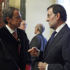 José Luis Rodríguez Zapatero junto a Mariano Rajoy