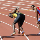 Bolt, a punto de recibir el último testigo del 4x100 jamaicano.