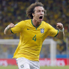 El rostro de David Luiz refleja la apoteosis brasileña tras el segundo gol a  Colombia.