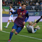 Messi celebra su tercer gol, cuarto del Barcelona, durante el partido frente al Málaga.