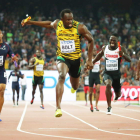 Usain Bolt consiguió su tercer oro en la prueba de relevos de 4x100 del Mundial de Pekín.
