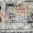 La creatividad del niño durante el vuelo ha quedado reflejada en el pasaporte de su padre.