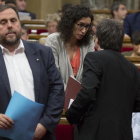 Oriol Junqueras junto a Marta Rovira y Carles Puigdemont durante una sesión de control en el Parlament.