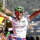 El ciclista del Katusha, Joaquín 'Purito' Rodríguez, celebra su llegada en primera posición a la meta de la octava etapa.