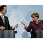 Mariano Rajoy y Angela Merkel, en una rueda de prensa conjunta en Berlín.